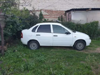Lada Kalina 2011 автомобиль, марка, модель: ЛАДА 111830 ЛАДА КАЛИНА, год выпуска ТС 2011, VIN:XTA111830B0240859, цвет: белый, экологический класс третий, мощность двигателя, кВт/л.с. 62/84, масса без нагрузки: 1080, тип ТС легковой. Техническое состояние: автомобиль на ходу, водительская дверь…
