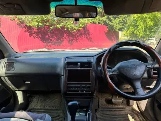 Toyota Carina, 1990 год выпуска, регистрационный знак Р656ЕТ03RUS, VIN не установлен, цвет темно-синий.