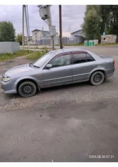 Автомобиль марки Мазда 323, год выпуска: 2003, двигатель: 664628, кузов: JM6BJ10M200209302 Шасси:   Мощность двигателя: 115 л.с.  84.6 кВт  СТС: 9959605720.