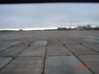 Взлетно-посадочная полоса в аэропорту г. Кедровый. Нежилое сооружение – взлётно-посадочная полоса, протяженность 1980 м, ширина 36 м. Кадастровый номер 70:18:0000006:910, адрес Томская область, г. Кедровый, квартал 22, сооружение 55а