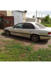 Opel Omega 1996 года выпуска, цвет серебристый (белый), номерной знак MO86MB13, VIN: W0L000026T1115447. Автомобиль на ходу, на зимней резине. Прогорела выхлопная система, климат не работает, трещина на лобовом стекле, проблемы с маслом. Основные лампочки горят. Горит чек, на движение не влияет…