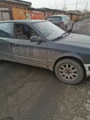 Audi 100 1991 года выпуска, VIN WAUZZZ4ZMN028972. Цвет кузова черный, механическая коробка передач.