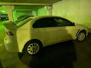 Mitsubishi Lancer 2010, 109 л.с., 100000 км. Автомобиль легковой, марка: Mitsubishi, модель: Lancer, VIN: JMBSNCY2ABU002146, гос. рег. номер: О391ВС190, год изготовления: 2010. Объект может быть приобретен с использованием заемных средств ПАО Сбербанк.