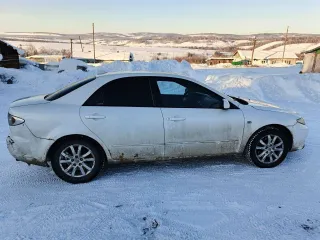 Mazda 6 2004 года выпуска. VIN: JMZGG12F551272370.