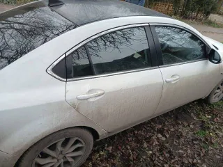 Mazda 6 2010 года, седан, белого цвета. VIN: JMZGH128211447142, госномер: Р808ВЕ40.