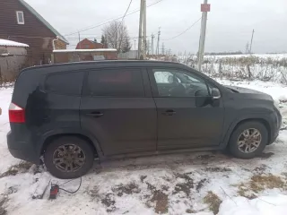 Chevrolet Orlando 2014 Легковой автомобиль ШЕВРОЛЕ ОRLANDO VIN: XUUYF755JE0002251 Год выпуска: 2014 Кузов: XUUYF755JE0002251 Цвет: Черный Тип двигателя: Бензиновый Мощность двигателя: 141 л.с. 102,7 кВт Рабочий объем двигателя: 1798 куб. см ПТС 50 РР 679540 СТС 99 65 № 931401 Вид права…