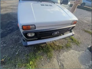 Легковой автомобиль Lada 212140 4x4, 2022 года выпуска, государственный номер С717ЕУ761, VIN XTA212140P2458816, белого цвета, без видимых повреждений, на передних дверях наклейка "Строй Автодор", 4 колеса с дисками, задние стекла тонированные, пробег 16637 км. Адрес: Ростовская область, г…