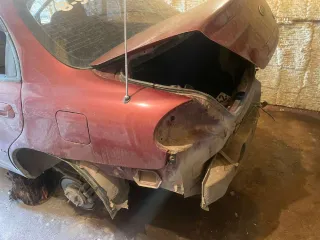 Легковой автомобиль Kia Spectra, 2008 года. Цвет: красный перец, VIN: XWKFB227380085200, госномер: Р892МК142. Технические особенности: автомобиль не на ходу, отсутствуют колеса, элементы молдинга, салона, отсутствуют передний и задний бампер, радиаторная решетка, передние и задние фары.