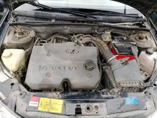 Лада Калина 2010 года, VIN: XTA111940A0113921, цвет черный.