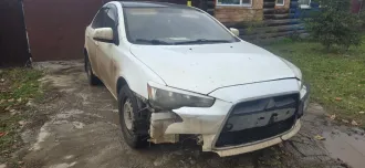 Mitsubishi Lancer 2011, год выпуска 2011 г., VIN JMBSNCY2ABU008026, пробег 329 588 км, двигатель бензиновый, находится в г. Благовещенске Республики Башкортостан
