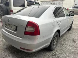 Легковой автомобиль Skoda Octavia, VIN XW8CA41Z4DK230248, 2012 год выпуска, серебристый цвет кузова.