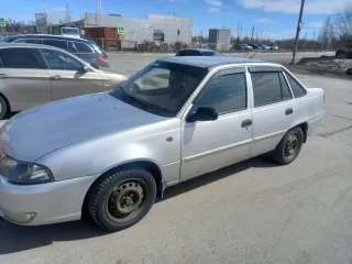 Daewoo Nexia 2009, модель: Нексия, год изготовления: 2009, цвет: перламутрово-серебр