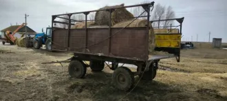 Прицеп 2ПТС-4 1987 года выпуска, красный, государственный номер 9962 СТ34.