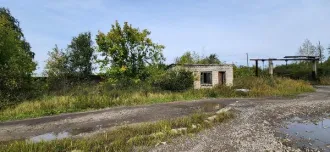 Здания гаража-ангара 547,9 кв.м, главного корпуса 1855,4 кв.м, КПП 28,9 кв.м, автогаража 2513,1 кв.м с земельным участком 26235 кв.м, Курганская область Объекты недвижимого имущества, расположенные на земельном участке, по адресу: Курганская область, г. Курган, ул. Омская, д. 179В Объекты…