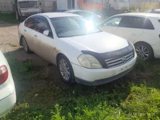 Легковой автомобиль седан Nissan Teana, 2003 г.в, г/н Х203ТО124, VIN отсутствует, модель, номер двигателя VQ23 0216998A, номер кузова J31021342, цвет белый. Рабочее состояние не проверялось, имеет вмятину на заднем бампере. Обременения: залог, запреты судебного пристава-исполнителя на…