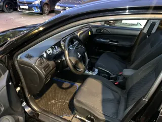 Mitsubishi Lancer 2009 года выпуска, VIN: JMBSNCS1A7U003242. Залог в пользу ПАО «Совкомбанк».