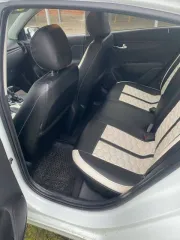 Автомобиль Kia Rio, 2017 года выпуска, VIN Z94C341BBJR022464, цвет белый, объем двигателя 1591 см³, мощность 123 л.с., тип кузова седан.