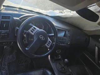 Infiniti FX 2003, 315 км, 300000 км, полный привод, АКПП. Легковой автомобиль, марка: INFINITI, модель: FX45 AWD, год изготовления: 2003, VIN: JNRBS08W83X000402, ПТС: 73НК546462, г/н: 11.02.2014.