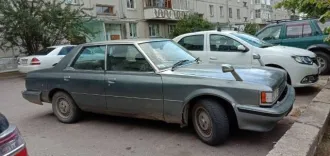 Toyota Cresta 1983, 135 л.с., 286000 км, легковой седан, VIN отсутствует, модель двигателя 1G, номер двигателя 5109149, кузов GX51-006961, цвет серый. Была замена двигателя, сейчас не на ходу, имеются вмятины, царапины (на фото), не эксплуатируется 3 года, хранится в гараже.