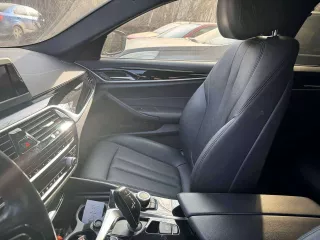 Легковой автомобиль BMW 520i VIN X4XJA19480WC06408 2018 года выпуска, черный. На ходу, документы и ключи в наличии.