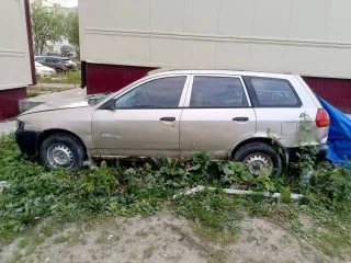 Mazda Familia 2002 года выпуска, номер двигателя YD22 056073A, ПТС 65 ТЕ 275821, государственный регистрационный знак МО83РА65.