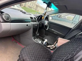 Mazda Axela 2007 года, 114 л.с., пробег 297000 км, АКПП. Автомобиль на ходу. Имеются многочисленные царапины и потертости по кузову, разбита передняя фара. Государственный номер Н911ЕТ125.