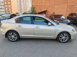 Mazda 3, 2006 МАЗДА 3, 2006 г.в., VIN: JMZBK12Z571549254 Легковой автомобиль МАЗДА 3, 2006 г.в., VIN: JMZBK12Z571549254, кузов № JMZBK12Z571549254, цвет СЕРО-ЗОЛОТИСТЫЙ, мощность (кВт/л.с.): 77.0/104.72 (царапина с левой стороны (передняя и задняя дверь), потёртости на заднем бампере справа, помят…