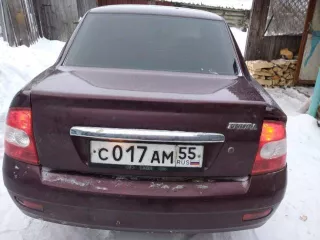 LADA Priora (217030) 2008 года выпуска, VIN: XTA21703080130702. Цвет кузова: Темно-Вишневый. Объем двигателя: 4596 см³, тип: легковой. Пробег: 390817 км. Находится в залоге у ПАО «Совкомбанк».
