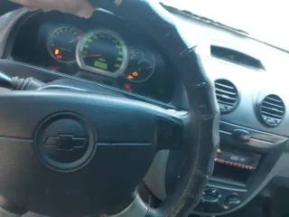 Chevrolet Lacetti, 2006 года, 109 лс, 403000 км. Состояние: В 2021 году была произведена замена двигателя, был куплен на площадке Авито у частного лица, на учет поставлен не был. Автомобиль был арестован приставами, находился на хранении у ФССП, после возврата двигатель сильно дымит, пороги…