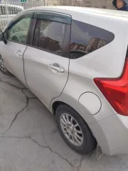 Автомобиль Nissan Note, легковой комби, 2014 года выпуска. Автомобиль Nissan Note, легковой комби, 2014 года выпуска, государственный номер Р174РЕ27, идентификационный номер (VIN) отсутствует, номер кузова (кабины) Е12320945, номер двигателя 067317В, цвет серый. Собственник - Падалко Л.Г…