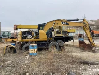 Экскаватор колесный Caterpillar M315D, цвет желтый, год выпуска: 2012, VIN (зав. №): CATM315DVJ5B00394
