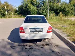 Mazda Familia, 2002. Легковой автомобиль, VIN: не установлен, мощность двигателя (кВт/л.с.): 63,75/85,0, гос. номер С224НН22. По кузову автомобиля присутствует коррозия, сгнившие пороги, арки, ржавчина на капоте, дверях и раме лобового стекла, пинается коробка с первой на вторую и не работает…