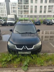 Mitsubishi Outlander 2008 OUTLANDER 2.4 Черный, VIN JMBXTCW5W9Z006075, год выпуска 2008, гос. номер К623РС702.