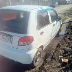 Daewoo Matiz 2012 года выпуска, цвет бело-дымчатый. VIN: XWB4A11EDCA034051, ПТС: 02 УР 003055, государственный номер: Х203КК163.
