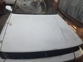 Toyota Chaser, VIN: 0, номер кузова LX80-5068982, 1989 год выпуска, легковой. На фотографиях видны разбитые переднее и заднее стекла. 1 шт.