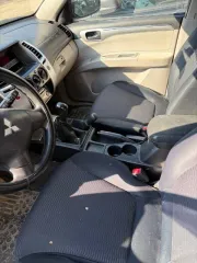 Mitsubishi Pajero Sport 2013 года, 178 лс, 213275 км, полный привод, цвет: черный, идентификационный номер (VIN): MMCGNKH40DFZ00553, модель двигателя 4D56, рабочий объем ДВС 2477, мощность ДВС л.с. 178
