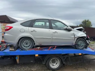 LADA 219070 2015 года выпуска. Цвет кузова серый, тип транспортного средства — легковой комби (хэтчбек). VIN: XTA219170FY174392, регистрационный знак К227СР126. Рабочий объем 1596 см³, мощность двигателя 78.01 кВт (106.1 л.с.), экологический класс 4. Имеется ограничение — запрет на регистрационные…