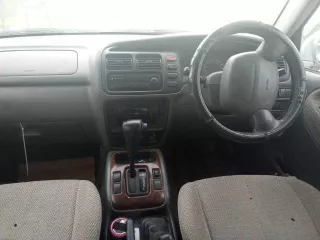 Suzuki Escudo, 1999 года выпуска, регистрационный номер С966КМ125, кузов TD62W101254.