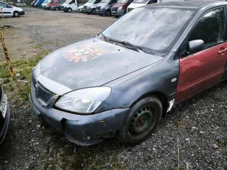 Mitsubishi Lancer 2006, 98 л.с., 299225 км. Легковой автомобиль, марка: Mitsubishi, модель: Lancer 1.6, год изготовления: 2006, цвет: серый, изготовитель (страна): Япония, разрешенная максимальная масса: 1750 кг, масса без нагрузки: 1260 кг, VIN: JMBSNCS3A6U020295, ПТС: 78ТТ 014498, г/н: Х389ЕР72…