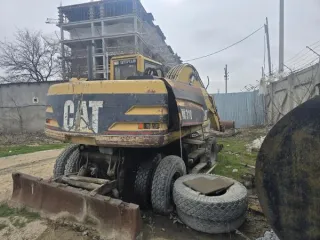 Caterpillar M318, 1996 Экскаватор колесный CATERPILLAR M318, гос/номер 4872ЕА 05, 1996 года выпуска, зав. №8AL00354, цвет желто-черный, местоположение: Республика Дагестан, г. Махачкала, пр. И. Шамиля 3Д. 1Б. Экскаватор колесный CATERPILLAR M318, гос/номер 4872ЕА 05, 1996 года выпуска, зав…