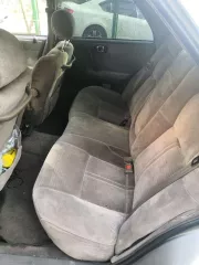 Автомобиль Toyota Crown, 1990 год, кузов LS131008926, серый.