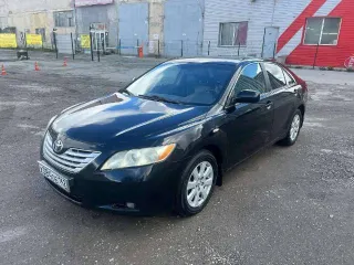 Toyota Camry 2007 года выпуска. Бензин, объем двигателя 2 362 см³, мощность 167 л.с. VIN JTNBE40K203127717. Коробка передач — автоматическая.