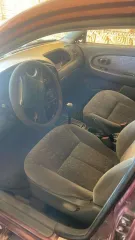 Легковой автомобиль Kia Spectra, 2008 года. Цвет: красный перец, VIN: XWKFB227380085200, госномер: Р892МК142. Технические особенности: автомобиль не на ходу, отсутствуют колеса, элементы молдинга, салона, отсутствуют передний и задний бампер, радиаторная решетка, передние и задние фары.