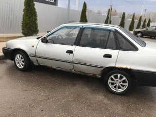 Daewoo Nexia 2006 года выпуска, серый светлый, VIN: XWB3D31UD6A067407, госномер: A821MC73.