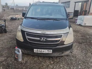 Hyundai Grand Starex, 2009 г.в., госномер Н846ХС154, VIN KMJWAH7JP9U153763, цвет черный (арест, повтор)