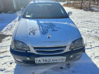 Легковой автомобиль Toyota Caldina 1998 года выпуска, государственный номер А162АМ49.