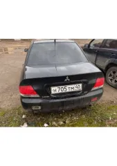 Mitsubishi Lancer 2005 года, 98 л.с. Автомобиль Mitsubishi Lancer 1.6, идентификационный номер (VIN): JMBSNCS3A5U021303, государственный регистрационный номер: Н705ТМ40, год выпуска 2005, цвет черный.