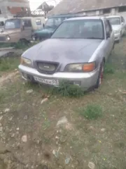 Honda Rafaga 1994 года, цвет серый, госномер К491ЕН03, номер двигателя 1561532, номер кузова СЕ4-1031295.