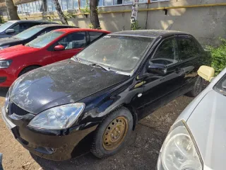 Mitsubishi Lancer 1.6 черный 2006 ЛАНСЕР 1.6 Черный 2006 г.в. Марка, модель: МИЦУБИСИ ЛАНСЕР 1.6Категория ТС: ВГод изготовления: 2006Идентификационный номер VIN: JMBSRCS3A7U013759Номер кузова: JMBSRCS3A7U013759Цвет кузова: ЧерныйРабочий объем двигателя: 1584 куб. смМощность двигателя (кВт)…