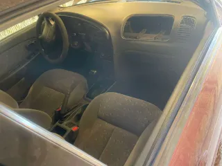 Легковой автомобиль Kia Spectra, 2008 года. Цвет: красный перец, VIN: XWKFB227380085200, госномер: Р892МК142. Технические особенности: автомобиль не на ходу, отсутствуют колеса, элементы молдинга, салона, отсутствуют передний и задний бампер, радиаторная решетка, передние и задние фары.